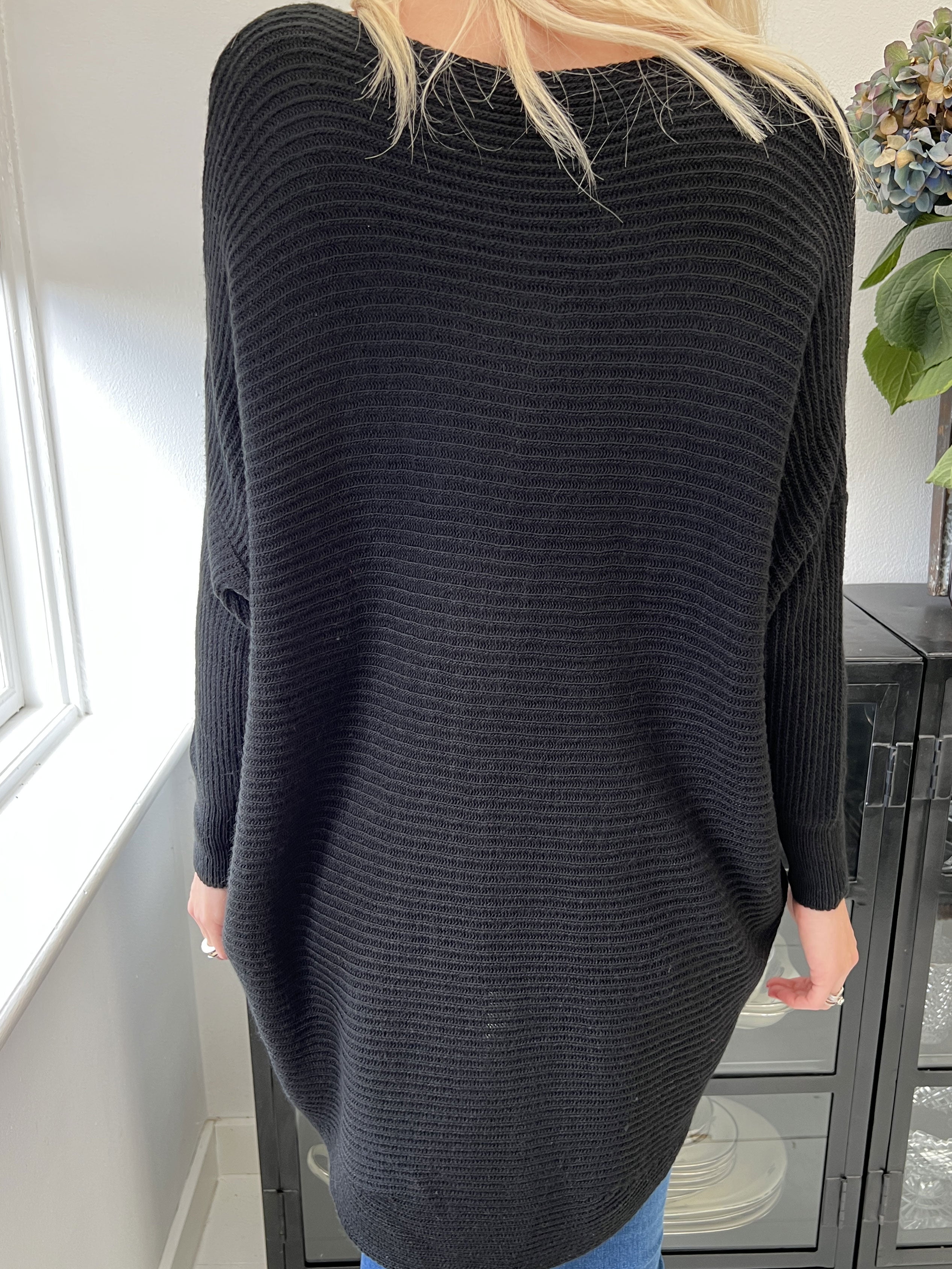 Teddy - Stickad blus med åtsittande ärmar